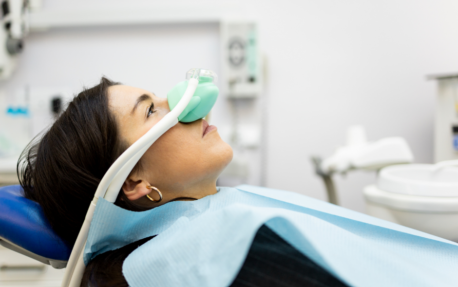 Woman wearing dental sedation mask